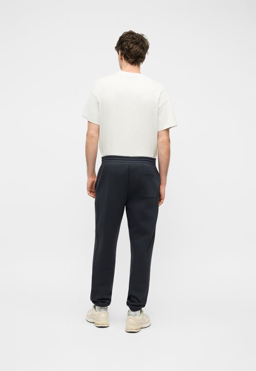 New Balance REIMAGINED GRAPHIC - Tracksuit bottoms - dark night — foto 3