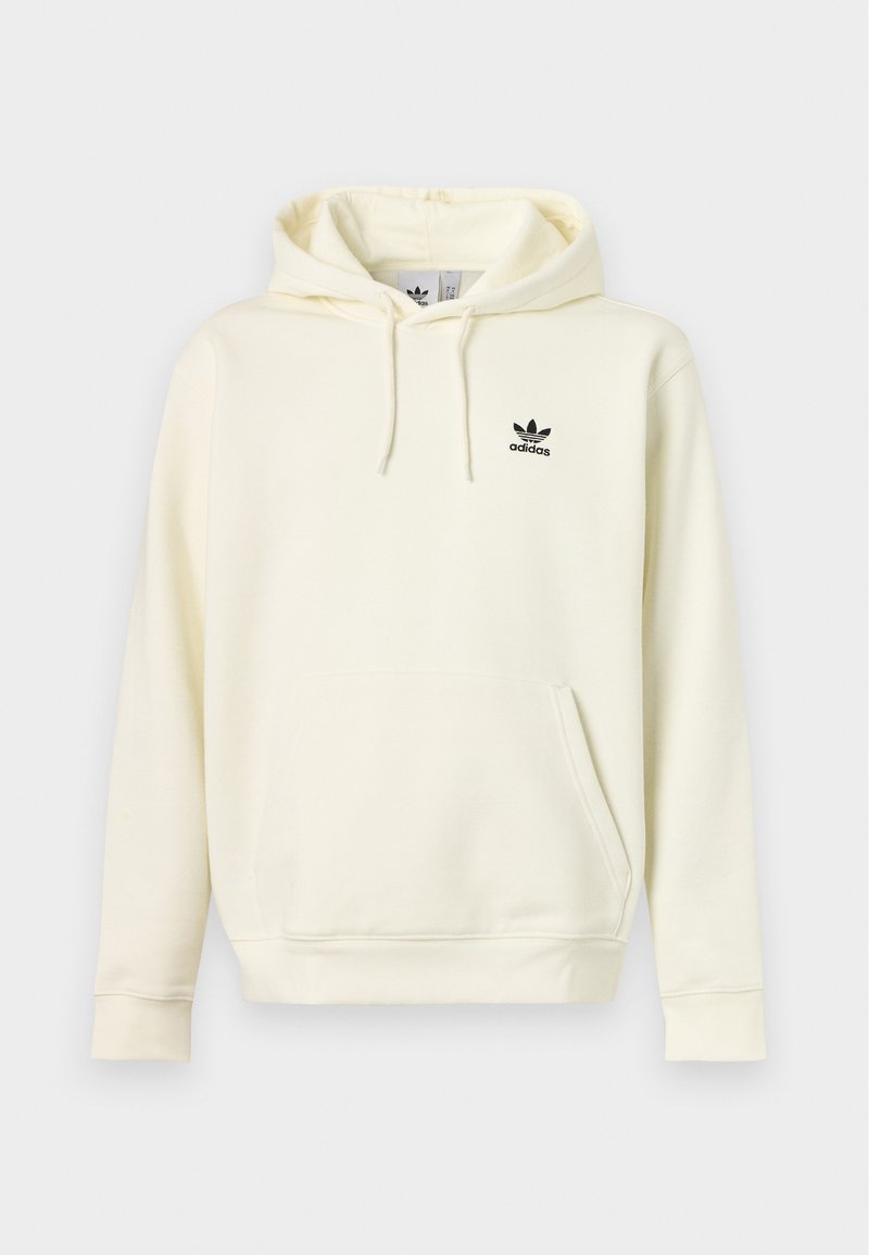 Kremowa bluza z kapturem Adidas z kieszenią z przodu, kapturem ze sznurkiem i małym czarnym logo Adidas na lewej piersi.