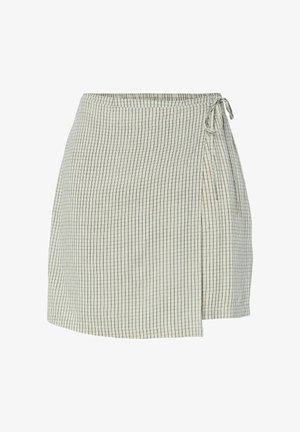 Fustă tip petrecută crem deschis cu model subțire în carouri negre și închidere laterală cu cordon, lungime peste genunchi, croială dreaptă.