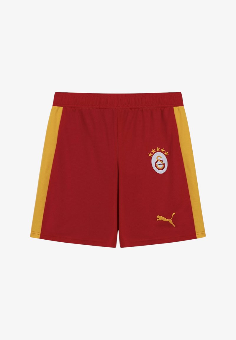 Pantaloncini sportivi rossi con strisce laterali gialle, emblema del Galatasaray con stelle sulla gamba destra e logo Puma giallo sulla gamba sinistra.