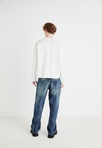 Weekday SPHERE LOW LOOSE - Ohlapne kavbojke - gasoline blue