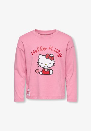 Różowy T-shirt z długim rękawem, na froncie z nadrukiem Hello Kitty w kolorach czerwonym i białym, z czerwonym kokardą i serduszkiem.