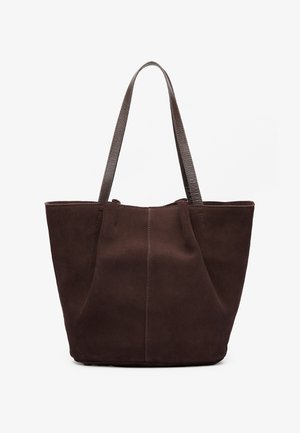 Brown suede tote bag with two textured leather handles. Features a simple, open-top design and subtle stitching along the front seam.