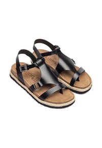 Sandali neri in pelle con soletta in sughero, caratterizzati da un design a fascia e fibbia regolabile. Dettagli simili alla juta lungo la suola. Suola piatta in gomma.