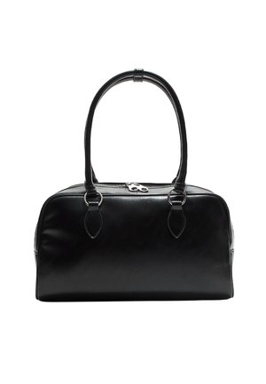 Sac à main en cuir noir avec deux poignées en boucle et une fermeture éclair argentée sur le dessus, présenté sur fond blanc.
