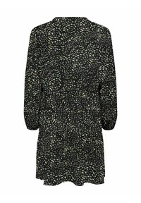 Robe noire avec un motif tourbillonnant crème et beige, manches longues, taille froncée et jupe évasée. Texture de tissu douce.