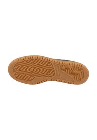 Shoe sole with brown rubber tread, herringbone pattern, and “FLAMINGOS LIFE vegan kicks” branding in center. Size 42 visible near heel.