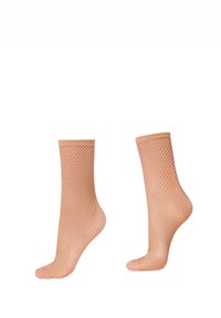 Knæhøje fiskenetstrømper i en nude farve, med et struktureret åbent mesh mønster og forstærket elastisk manchet.