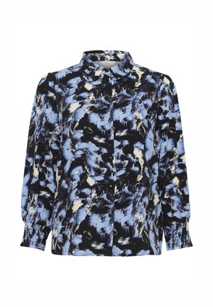 Blouse à manches longues présentant un motif abstrait audacieux bleu, noir et crème. Tissu doux avec un devant à boutons et des poignets froncés.