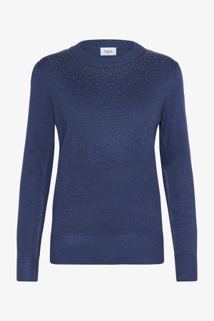 Pull bleu marine à col rond, manches longues et ourlet côtelé. Présente des clous décoratifs subtils disposés en dégradé.