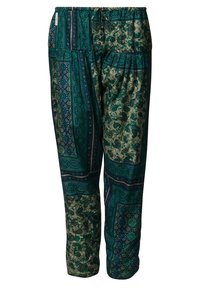 Lösa byxor med resårmidja. Har ett grönt och blått mönstrat tyg, inklusive paisley- och geometriska mönster.