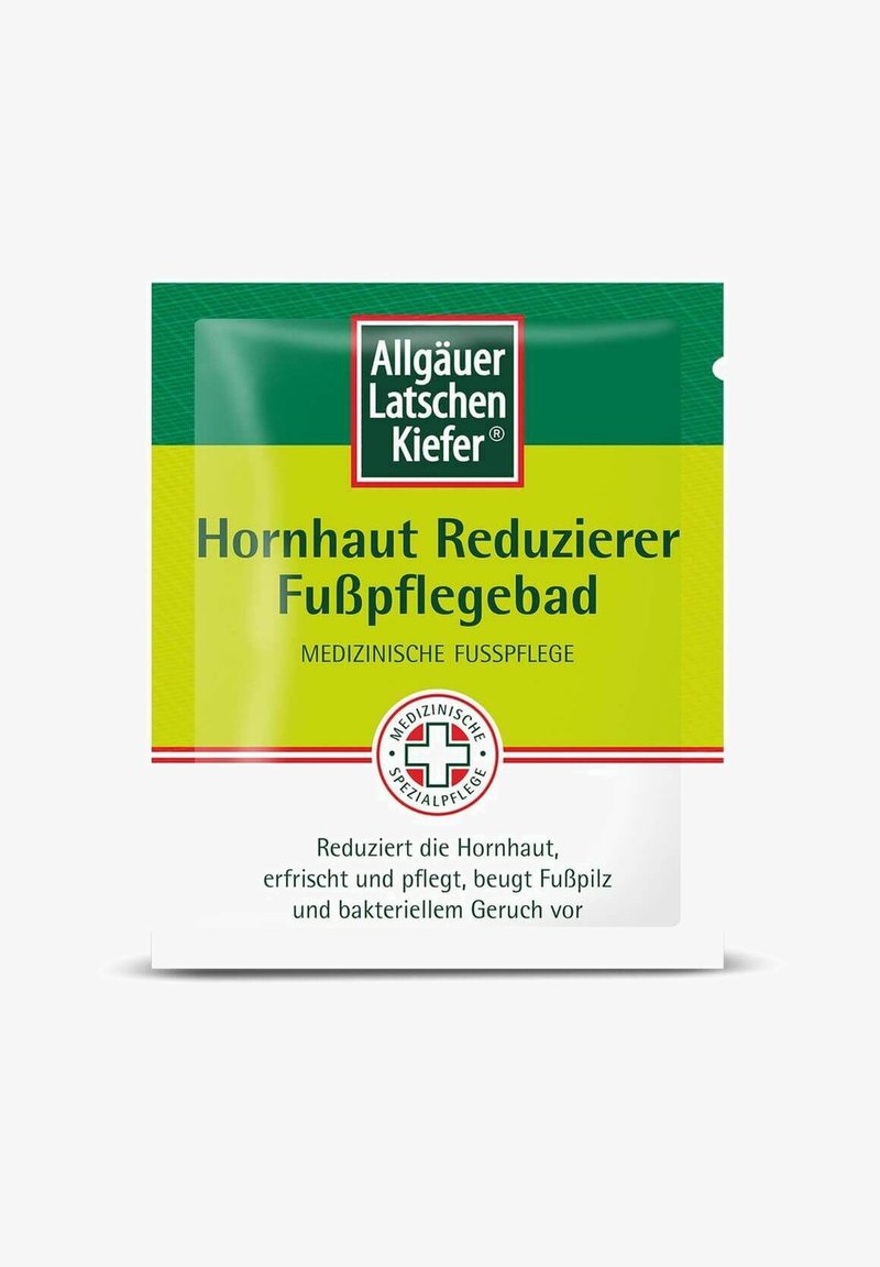 Grünes und gelbes Beutelverpackung für Fußbad, mit deutscher Schrift. Enthält ein Symbol des medizinischen Kreuzes. Produktname und Details sind prominent angezeigt.