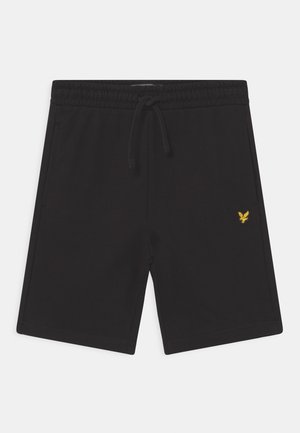 Pantalones cortos negros informales con cintura elástica, cordón ajustable, bolsillos laterales y pequeño logo de un pájaro amarillo en el muslo derecho.
