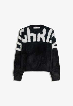 Black fuzzy sweater featuring large white lettering across the front, round neckline, and long sleeves with ribbed cuffs.