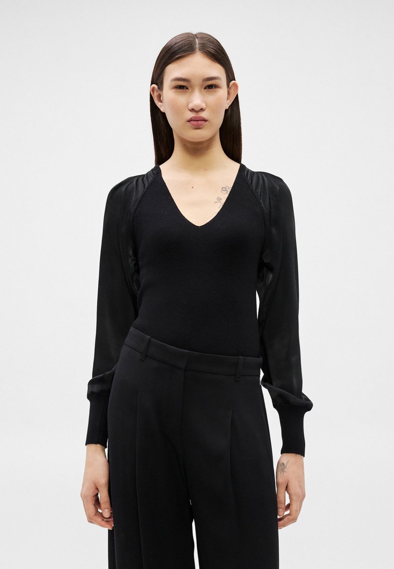 DKNY Maglia A Maniche Lunghe con Scollo A V Felpa Donna