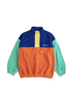Fleece-pullover med blå overdel, orange krop, grønne ærmer, gul kvartlynlås og "Bobo Choses" broderet på brystet.