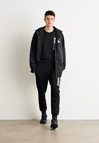 Calvin Klein HORIZONTAL LOGO SWEATPANTS - Παντελόνι φόρμας - black