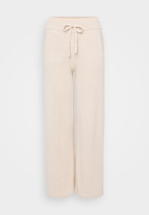 Beige wide-leg pants with a soft texture, featuring a drawstring waistband and side pockets. Straight cut with clean hems.