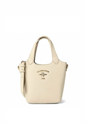 Bolso de cuero color crema de U.S. Polo Assn. con dobles asas, correa ajustable para el hombro y emblema con logo dorado en el centro frontal.
