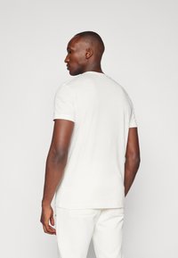 Björn Borg ESSENTIAL - Basic póló - cloud dancer