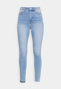 Světle modré vysoké skinny jeans vyrobené z denimu, s předním zapínáním na knoflík, poutek na opasek a úzkým střihem s minimálním opotřebením.