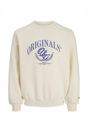 Bluza w kolorze kremowym z niebieskim napisem "ORIGINALS" oraz dekoracyjnymi inicjałami "OG" na środku, z gałązkami laurowymi oraz żebrowanymi ściągaczami przy mankietach i dole.