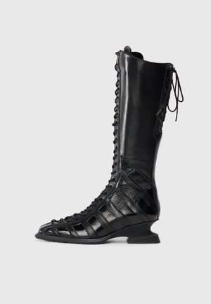 NELLY - Lace-up boots - black