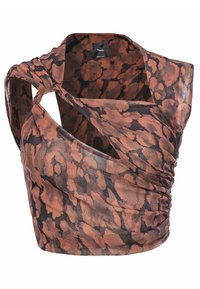Top in stampa animale marrone e nero con design annodato, tessuto drappeggiato e stile asimmetrico senza maniche. Tessuto leggero e trasparente.