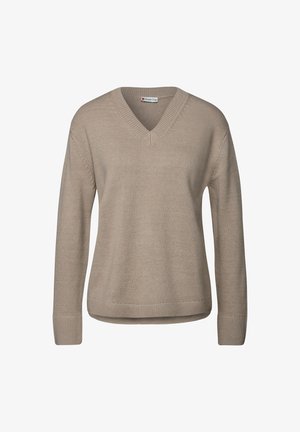 Pull en tricot beige avec un col en V, des manches longues, des bords côtelés et une coupe décontractée. La texture du tissu semble douce et légère.