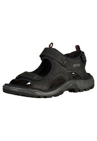 Sorte sandal fra ECCO med syntetisk overdel, justerbare stropper, åpen design og teksturert gummisåle med godt grep.