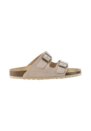 Sandalia tipo pala de ante beige con dos correas ajustables con hebillas y una suela de goma texturizada para uso casual.