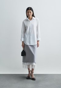 Cult Gaia RUE WRISTLET - Ručna torbica - black