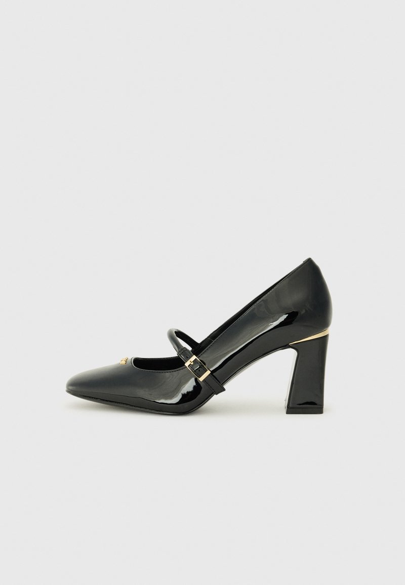 Black patent leather high heel shoe with a pointed toe, ankle strap, and gold accent at the heel. Square block heel design.