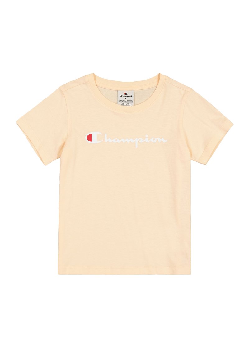 Camiseta de algodón amarillo claro con mangas cortas, que presenta un logo blanco de "Champion" y un acento rojo en el lado izquierdo.