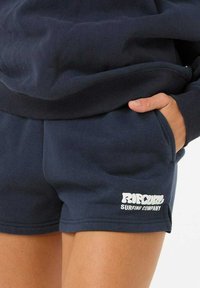 Navyblauwe shorts van een katoenmix met een geribde tailleband en zakken. Voorzien van een wit "Rip Curl Surfing Company" logo.