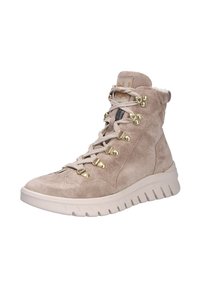 Bottes chelsea en suède beige avec des garnitures dorées, design à lacets, col rembourré et semelle texturée pour une meilleure adhérence. De surcroît, un surpiquage audacieux accentue la tige.