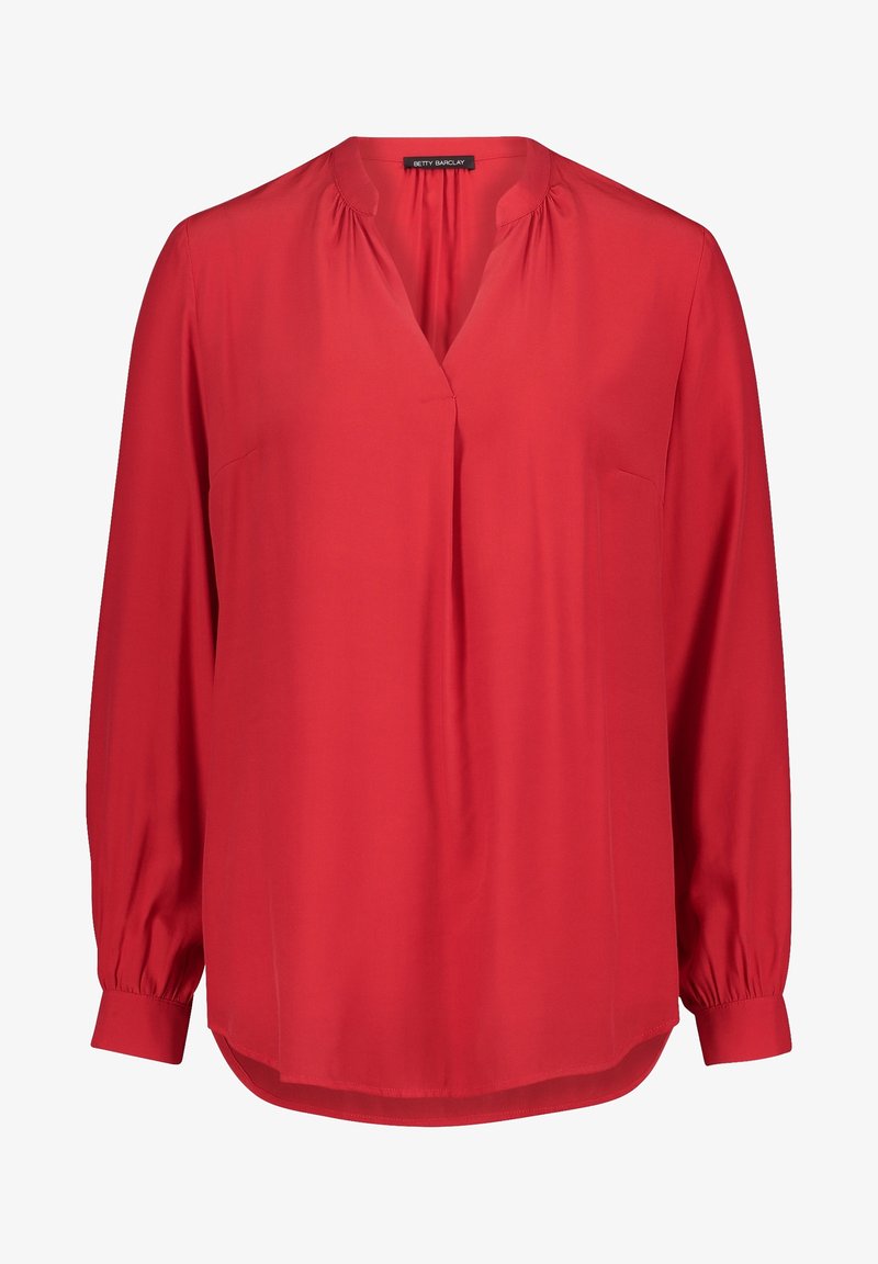 Blouse rouge à manches longues avec col en V, légers fronces au col, poignets boutonnés et ourlet arrondi par Betty Barclay.