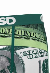 Boxers laget av stretchstoff med trykk av grønne dollar- sedler; har en bred grønn elastisk linning med hvit tekst og strukturert detaljering.