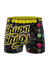 Boxer-culottes noires avec un logo "Chupa Chups" jaune, comportant des graphismes de bonbons colorés en motifs circulaires et une ceinture jaune.