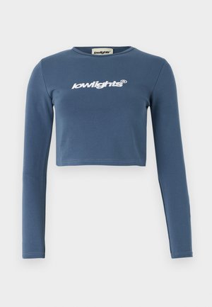 Modra kratka dolga majica z dolgimi rokavi, izdelana iz mehke bombažne tkanine, s belim vezenim logotipom "lowlights" na sprednji strani. Gladka tekstura, rebrast ovratnik.