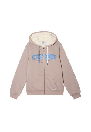 Sweat à fermeture éclair beige avec doublure en polaire blanche, texte bleu "CREEKS" sur le devant, capuche avec cordon de serrage, poches avant et poignets et ourlet côtelés.