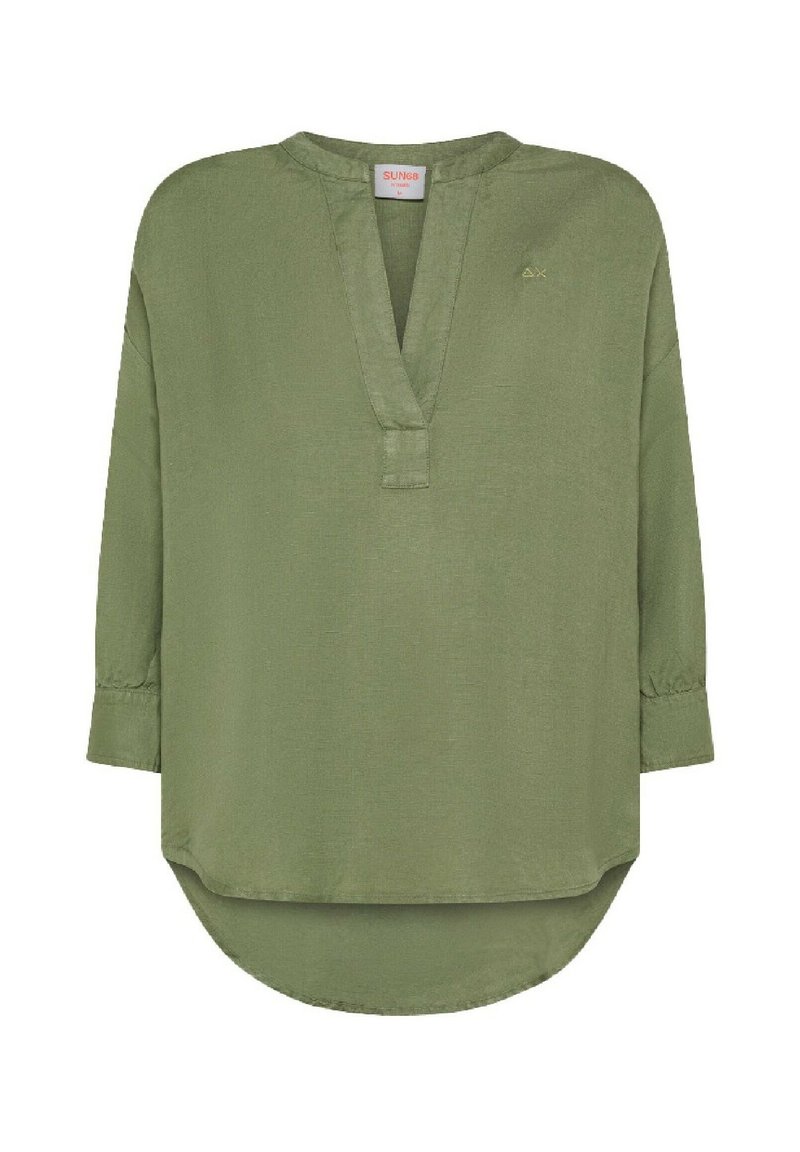 Tunic a maniche lunghe, verde oliva, con scollatura a V e pattina anteriore. Tessuto leggero e testurizzato con orlo arrotondato. Sottile accento del marchio.