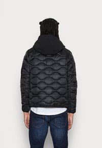 Calvin Klein Chaqueta de entretiempo - black