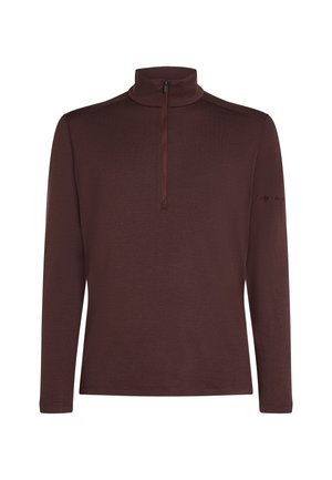 Dlouhý rukáv, pulovr na zip v tmavě burgundské barvě. Vyrobeno z hladké, texturované tkaniny bez vzorů. Obsahuje malé logo na rukávu.