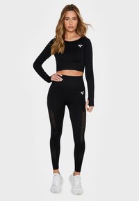 SQUATPROOF LONG SLEEVE - Sports T-shirts - black