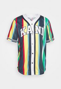 Meerkleurig honkbalshirt met verticale strepen in marineblauw, geel, groen, rood en blauw. Logo vooraan met de tekst "KANI." Voorzien van knopen en een kraag.