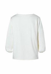 Witte lange mouwen top met een relaxte pasvorm, ronde halslijn en pofmouwen. Zachte textuur; eenvoudig ontwerp zonder patronen of versieringen.