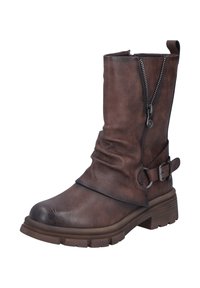 Brown leather ankle boot with a slouchy design, side zip closure, and buckle accent. Features a textured upper and a thick, ridged sole.