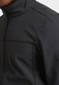 TOG24 FEIZOR - Light jacket - black