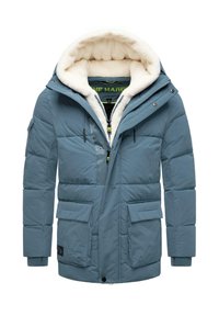 Padded blue winter jacket with a fluffy white interior, a hood, front zipper, and multiple pockets, featuring a color-contrasting lining.